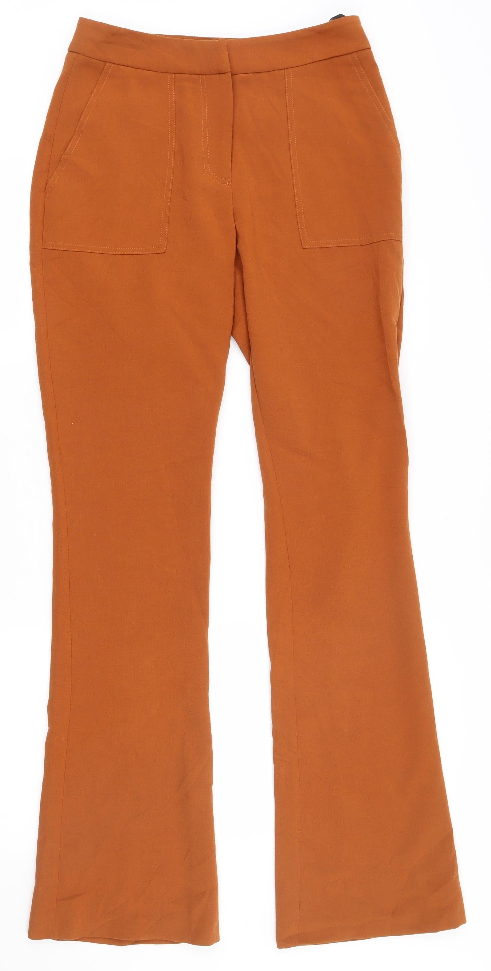 Topshop store orange trousers