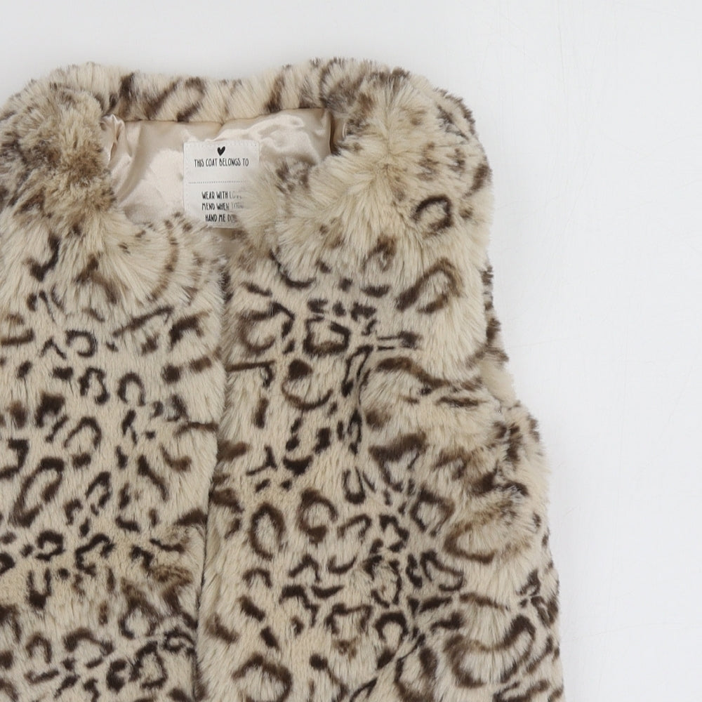 This Coat Belongs To Girls Beige Animal Print  Gilet Jacket Size 5-6 Years
