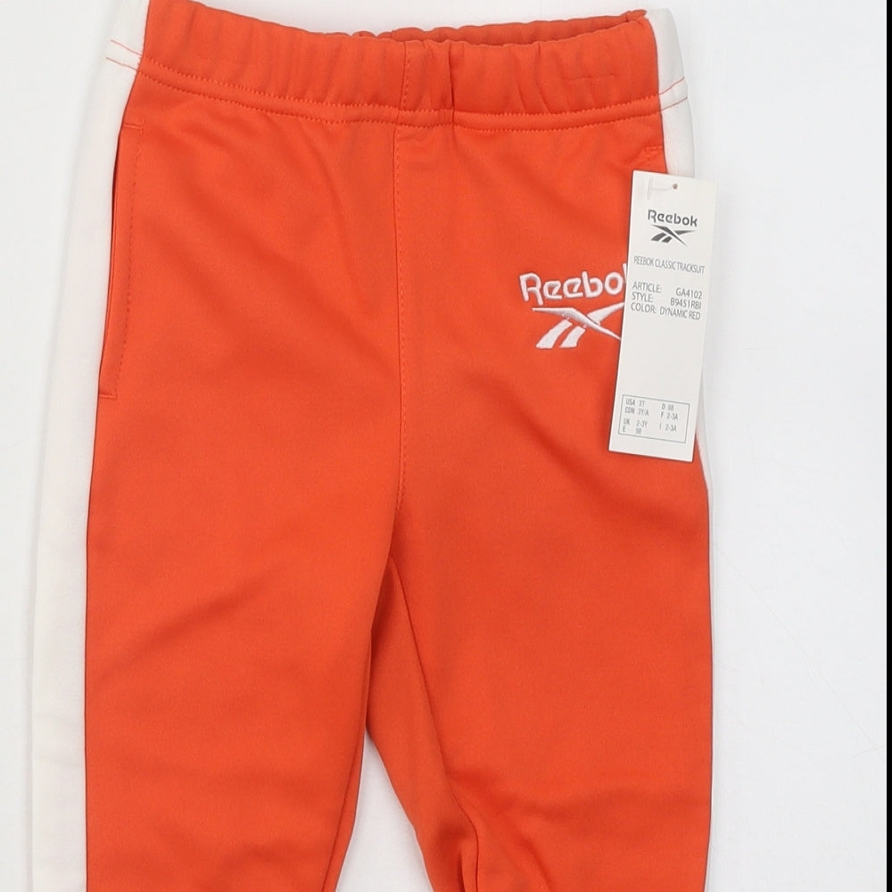 Reebok trousers shop orange